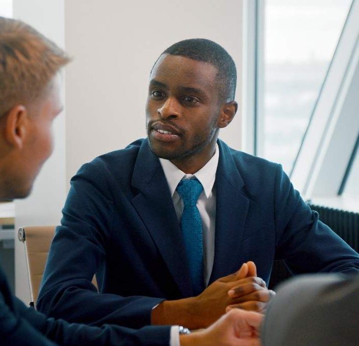 corporate-leader-manager-communicating-with-his-te-2024-09-22-16-12-46-utc (1)